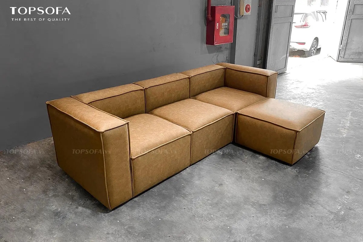 Sofa góc TS207 thiết kế dáng chữ L với phần góc vuông vức, bo góc gọn gàng, đường nét dứt khoát, viền chỉ chắc chắn giúp tiết kiệm không gian phòng khách chung cư và dễ dàng bài trí nội thất xung quanh