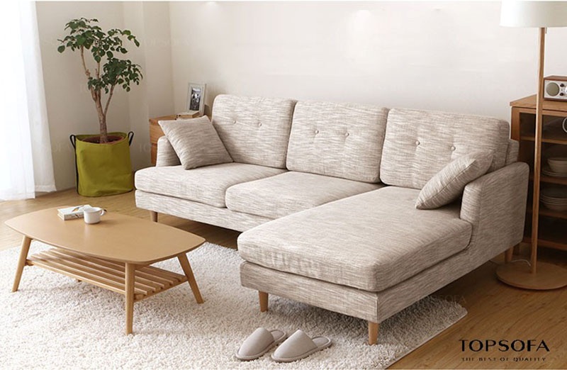 Thiết kế hình chữ L nhỏ gọn, đơn giản cùng tông màu sáng giúp mẫu sofa góc nhỏ gọn TS211 dễ dàng chinh phục vị trí góc của những căn phòng hẹp