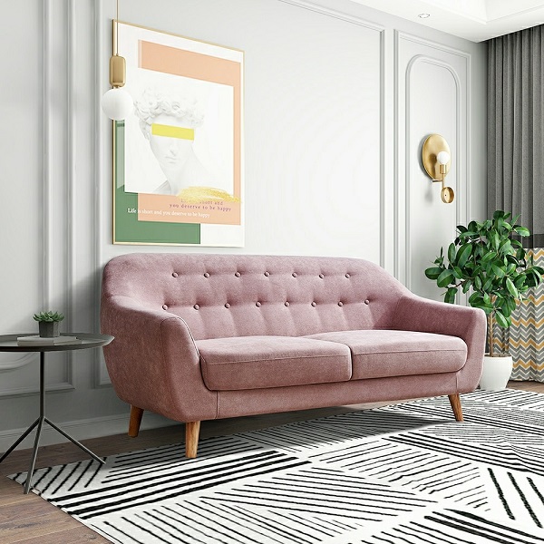 Sofa văng mini tông màu hồng ngọt ngào cùng họa tiết cúc đính lưng tựa đem đến không gian trang trí mới mẻ