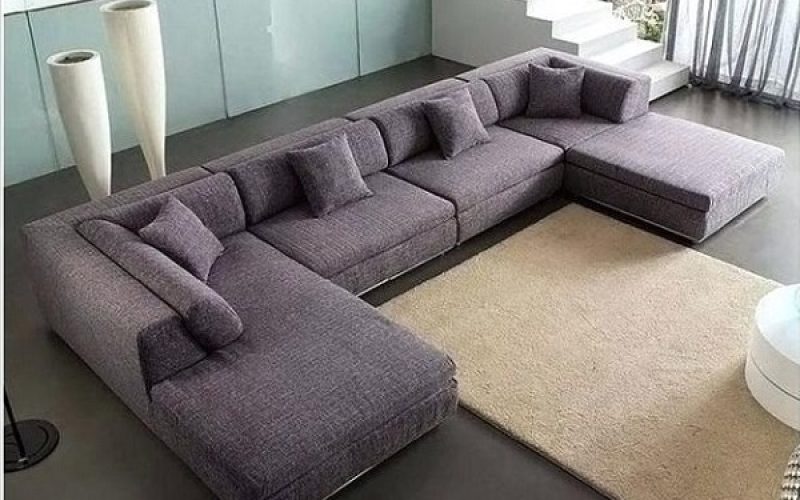 Mẫu sofa màu tím mệnh Hỏa, với thiết kế vải trơn hiện đại, màu sắc vừa tinh tế vừa dễ nhìn, phù hợp với bất kỳ không gian nào.